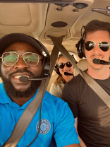 Aero Global Aviation Academy instructor with 2 persons