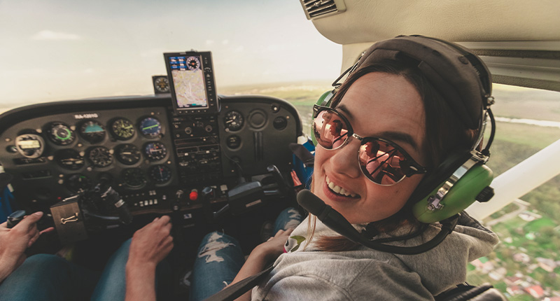 Young pilot smiling.
