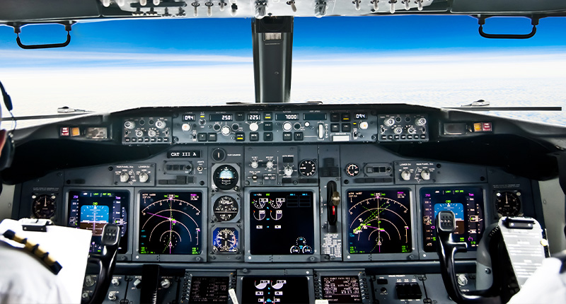 Plane's instrument dashobard in night.