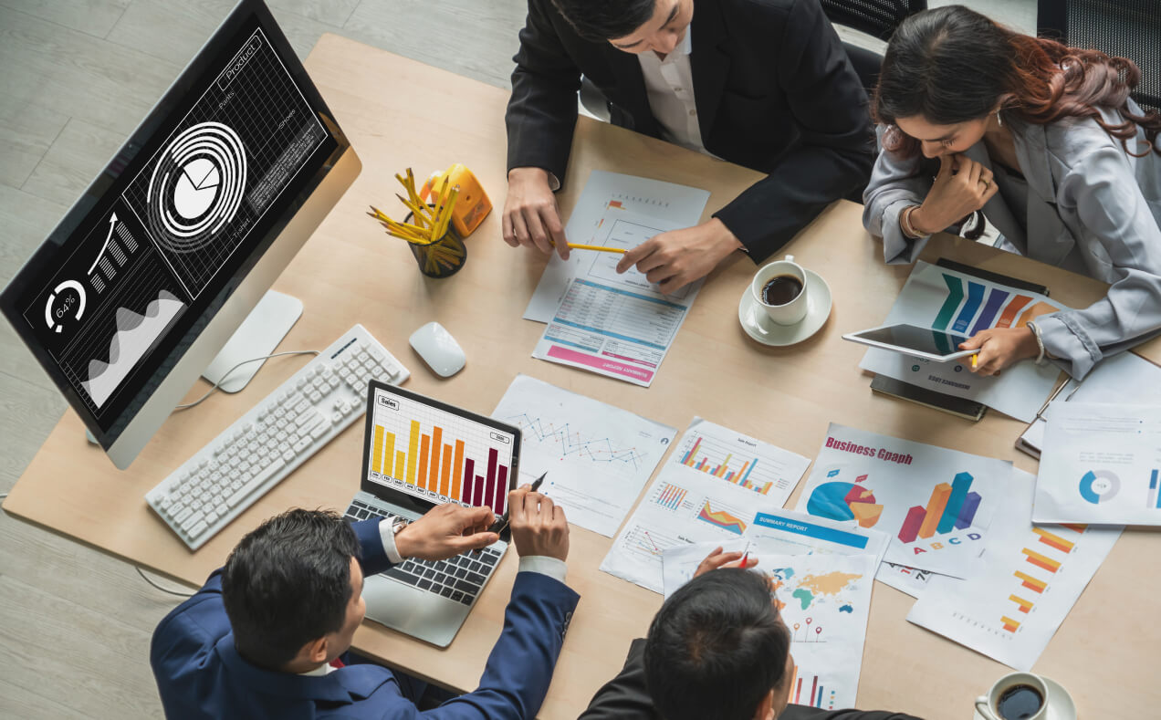Young pilot with glasses smiling to the camera.