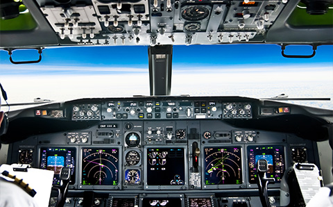 Aircraft's cockpit instruments in night time.